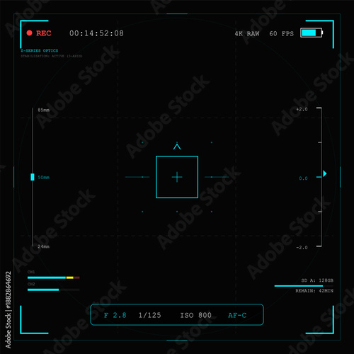 A screen shows the recording settings for a camera. It displays details like exposure, frame rate, and ISO. The layout features a grid and indicators in a dark background.