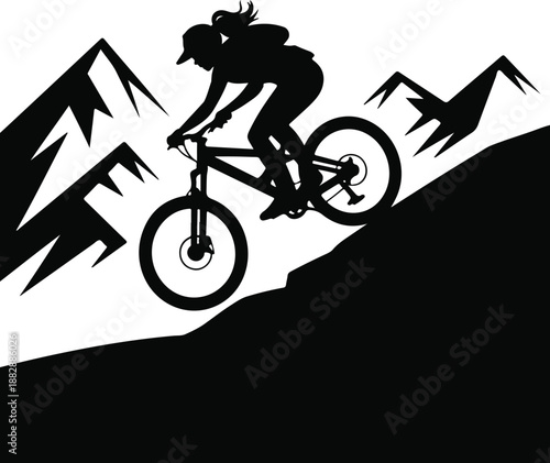 Silhouette of a Woman Mountain Biking Downhill