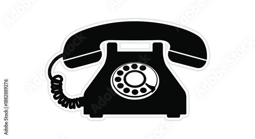 A striking black and white image depicts a vintage rotary telephone showcasing a classic design and evoking nostalgia silhouette high quality