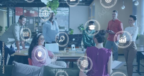 Presenter raising hand driving business icons drifting in modern office during brainstorming