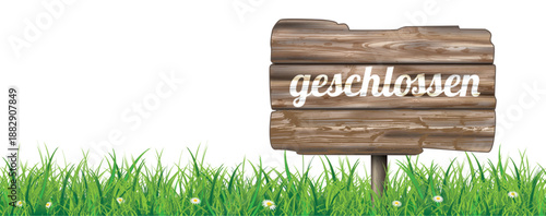 Holzschild mit dem Text Geschlossen im Gras