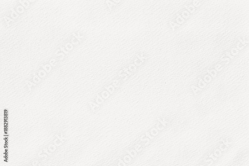 Texture of plain white paper. The textured surface of watercolor paper with raised and recessed areas.