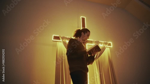The scene captures a worshipper in motion, energetically engaging with scripture as he walks and prays.