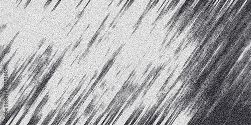 Abstract diagonal lines with a grainy texture creating a dynamic, textured background with a sense of motion and depth in grayscale