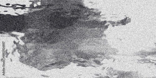 Abstract monochrome textured background with grainy overlay and organic cloud-like shapes in dark and light tones creating a dynamic visual effect and artistic impression Keywords: abstract