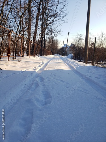 Snow-covered country road