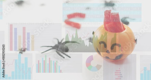 Charts shifting and morphing data causing spider stirring and crawling toward pumpkin candy holder