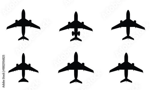 Collection of six black airplane silhouettes viewed from above on white.