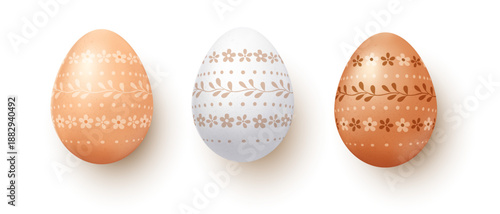 Three realistic Easter eggs with delicate floral and dotted ornaments in warm pastel tones, isolated on white background for holiday designs, cards, packaging and seasonal decorations.