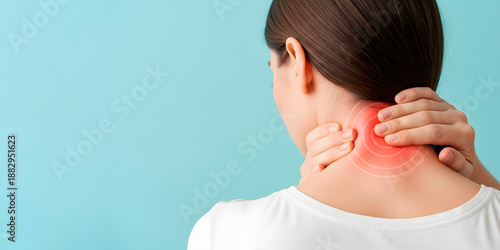 Woman massage her painful neck due to muscle tension or injury, providing relief for discomfort and stress. Concept of self care and wellness. Copy space background