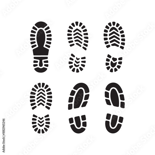 Black shoe prints illustration with varied patterns on white background