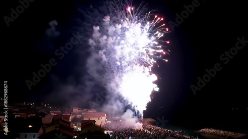 Spectacular Fireworks Display Illuminates Night Sky Over Coastal Town Celebration