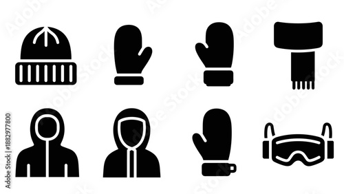 Winter clothing silhouette icons: hats, mittens, scarves, and goggles