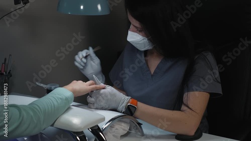 Forming polygel layer on nail using orange stick during nail plate modeling process

