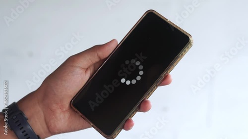 System error, slow loading, no connection to wifi on mobile smartphone screen in man hand. No signal internet connection on cellphone. System software update and upgrade loading process.