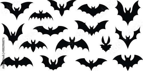 A grouping of different black bat outlines showcasing their spread wings against a bright white background