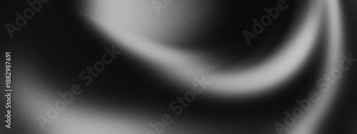 Photos Dark gradient background with grainy noise texture creates an elegant monochrome backdrop perfect for modern poster designs and creative projects