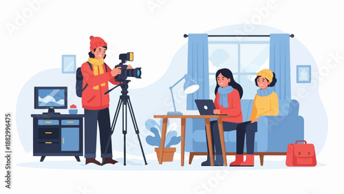 Three people in a room, one filming, two others seated