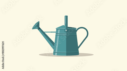 Teal metal watering can with spout and handle on cream background