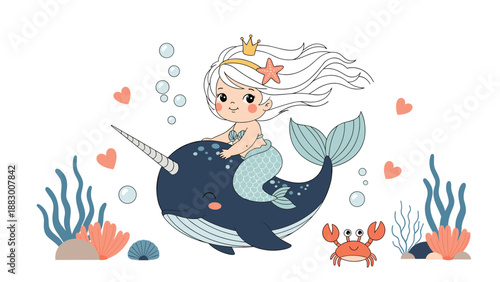 Pretty mermaid with long flowing hair rides a large friendly narwhal underwater surrounded by coral and sea life.