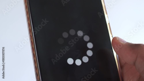 System error, slow loading, no connection to wifi on mobile smartphone screen in man hand. No signal internet connection on cellphone. System software update and upgrade loading process.