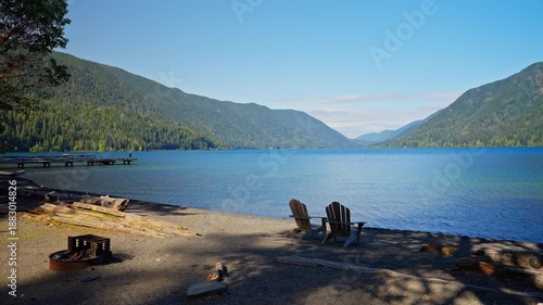 Lake Crescent in Olympic National Park, Washington, with clear blue water, forested shores, and mountain scenery. Ideal for nature, travel, and landscape footage.