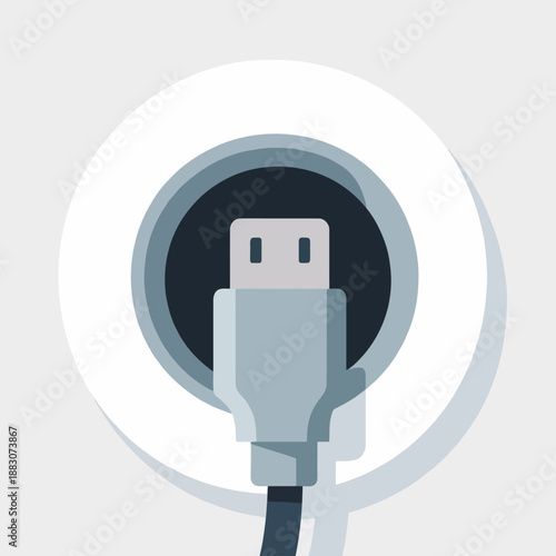 USB charging cable connector plugging into a circular wall power outlet port for mobile device battery recharging and data transfer in a modern smart home.