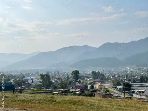Village at the foot of the green hill, Altai, Russia