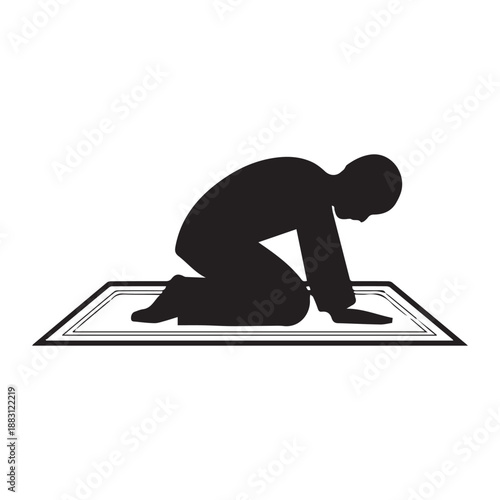 Silhouette of a Muslim Man Performing Sujud Prayer on a Traditional Mat.