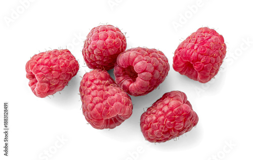 Vibrant Raspberries in Close-Up on a White Background. Top view of scattered raspberries isolated.