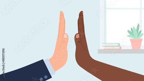 Two hands, one light-skinned, the other dark-skinned, high-five over a desk