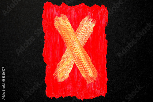 赤い筆致のバツ印　黒背景の警告サイン　コピースペース素材