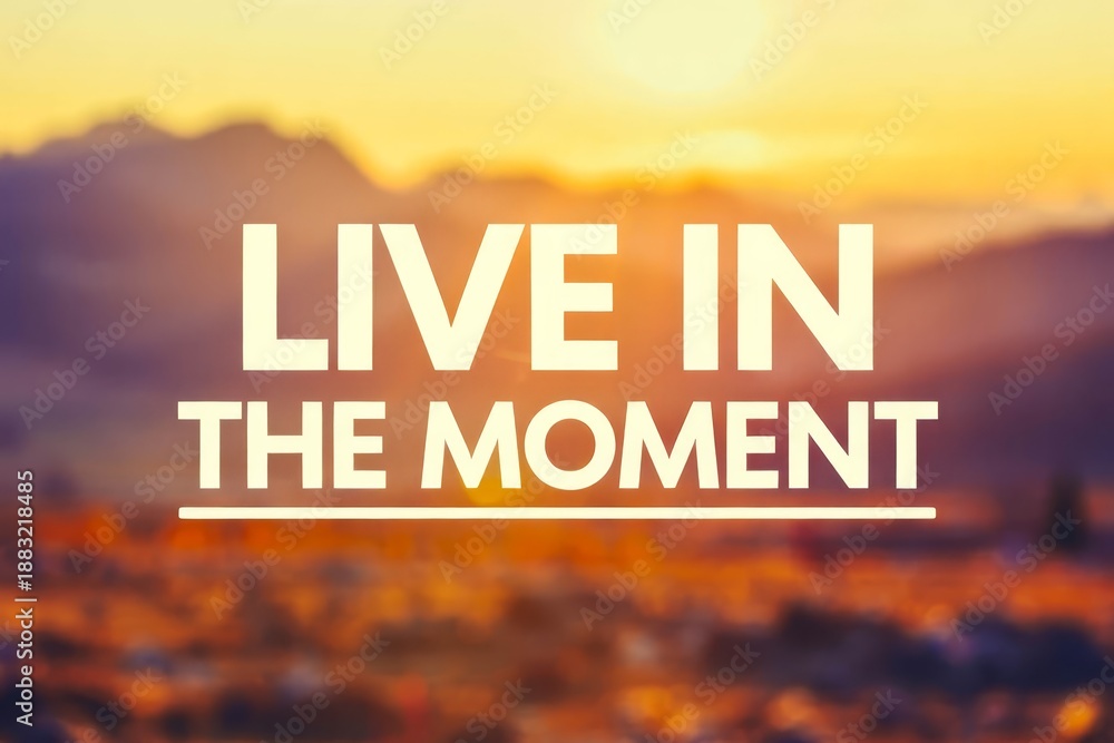 Naklejka premium Inspirational motivation quote with blurred background. LIVE IN THE MOMENT.