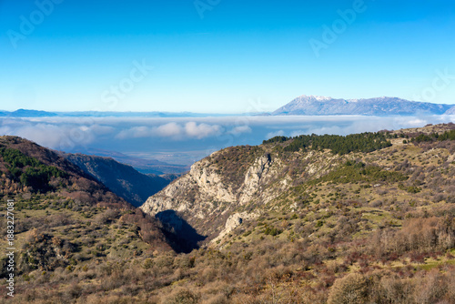 Abruzzo Apennine mountain landscape with valley clouds in Italy