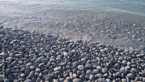 Sea stones arranged to create a textured background suitable for editorial headers or design elements
