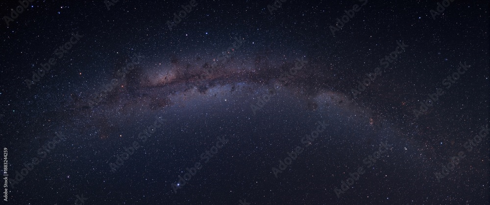 Fototapeta premium Wide-angle view of the Milky Way galaxy showing stars and space dust in the universe, long exposure photograph, high resolution with grain