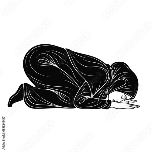 A person in a black robe is kneeling in prayer, head bowed down.