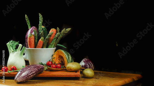 mixed vegetables on a table with black background