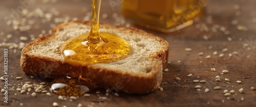 Sweet honey flowing onto bu...