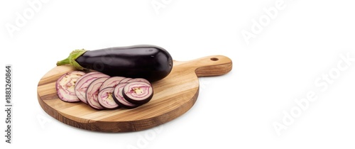 Eggplant slices on chopping...
