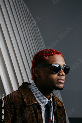 Portrait of black man wearing sunglasses with copy space