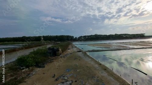 Wallpaper Mural Traditional Salt Pan Farm in Coastal Area with Cloudy Sky Landscape Torontodigital.ca