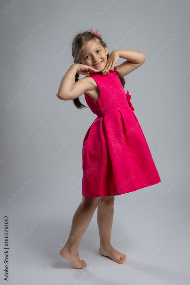 custom made wallpaper toronto digitalSmiling Young Girl in Elegant Pink Dress Posing in Studio. Happy Childhood Fashion Portrait, Kids Clothing, Celebration, Birthday and Family Lifestyle Concept