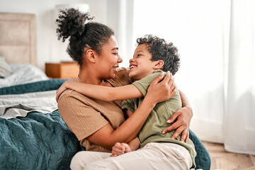 Mother and son hugging at home, celebrating Mother’s Day, sharing love and joyful family moments.Happy Mother's Day!