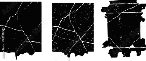 Three grunge distressed black paper sheets with white cracks and tears