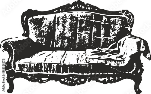 Vintage ornate sofa with detailed wooden frame and worn upholstery