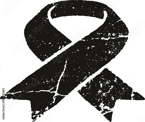Grunge black awareness ribbon with distressed texture and rough edges symbolizing support and remembrance