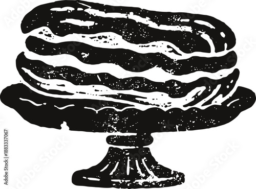 Classic layered cake served on decorative pedestal stand with textured icing design