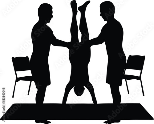 Three individuals engaging in a guided handstand exercise with assistance on a mat