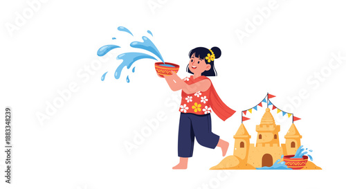 Happy girl throwing water from a bowl while standing next to a decorated sandcastle to celebrate songkran festival.